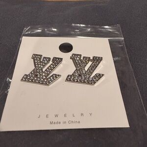 Bold. Sparkly. Statement-making. Earrings. Gold. Silver. Rhinestones